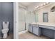 Bathroom featuring a tiled floor, a shower, and vanity with a sink at 3742 E Sandy Way, Gilbert, AZ 85297
