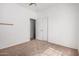 This bedroom has neutral walls and carpet with a closet at 3742 E Sandy Way, Gilbert, AZ 85297