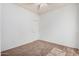 This bedroom has neutral walls and carpet with a ceiling fan at 3742 E Sandy Way, Gilbert, AZ 85297