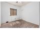 Comfortable bedroom features carpet, a window, and closet with sliding doors at 3742 E Sandy Way, Gilbert, AZ 85297