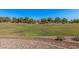 Expansive green common area in the neighborhood, with trees and manicured landscaping at 3742 E Sandy Way, Gilbert, AZ 85297