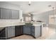 The kitchen features stainless steel appliances, light countertops, and light cabinetry at 3742 E Sandy Way, Gilbert, AZ 85297