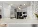 Well-equipped kitchen with modern appliances, gray cabinets and long countertop for meal prep at 3742 E Sandy Way, Gilbert, AZ 85297
