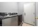 Laundry room features front-load washer and dryer at 3742 E Sandy Way, Gilbert, AZ 85297
