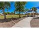 Enjoy the community park with a picnic area, walking path, and green grass at 3742 E Sandy Way, Gilbert, AZ 85297
