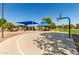 Community park featuring a playground, gazebo, and basketball court, providing recreational opportunities at 3742 E Sandy Way, Gilbert, AZ 85297