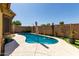 Backyard swimming pool with clear blue water and desert landscaping for relaxation and outdoor fun at 3742 E Sandy Way, Gilbert, AZ 85297