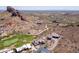 Aerial view of desert home nestled in golf course community at 4366 S Avenida De Angeles --, Gold Canyon, AZ 85118