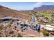 Luxury home in desert community featuring a courtyard, pool and private road at 4366 S Avenida De Angeles --, Gold Canyon, AZ 85118