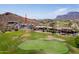 Aerial view of the estate, highlighting its location on a golf course and its stunning mountain backdrop at 4366 S Avenida De Angeles --, Gold Canyon, AZ 85118