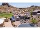 Elegant home with desert landscaping and a paved driveway near a golf course at 4366 S Avenida De Angeles --, Gold Canyon, AZ 85118