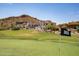 Beautiful home situated on the Gold Canyon Golf Course, showcasing its desert landscape and architectural elegance at 4366 S Avenida De Angeles --, Gold Canyon, AZ 85118