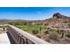 Scenic view of a golf course and desert landscape from a home's balcony, showcasing outdoor beauty at 4366 S Avenida De Angeles --, Gold Canyon, AZ 85118