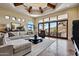 A gorgeous living room with many windows and tile floors provides lots of natural light at 4366 S Avenida De Angeles --, Gold Canyon, AZ 85118