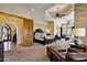 This primary bedroom features tray ceiling, ceiling fan, and a private access to a balcony at 4366 S Avenida De Angeles --, Gold Canyon, AZ 85118