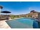 Beautiful pool and outdoor living area with stunning mountain views in the background at 4366 S Avenida De Angeles --, Gold Canyon, AZ 85118
