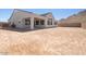 Spacious backyard with covered patio at 4822 W Owl Head Pl, San Tan Valley, AZ 85144
