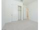 Clean bedroom with carpet and closet at 4822 W Owl Head Pl, San Tan Valley, AZ 85144