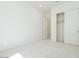 Light-filled bedroom with closet and doorway at 4822 W Owl Head Pl, San Tan Valley, AZ 85144