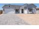 Charming single-story home with a three-car garage and a paver driveway at 4822 W Owl Head Pl, San Tan Valley, AZ 85144