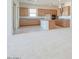 Open-concept kitchen featuring granite countertops, stainless steel appliances and light wood cabinetry at 4822 W Owl Head Pl, San Tan Valley, AZ 85144