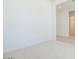 Spacious living area with plush carpet and plenty of natural light at 4822 W Owl Head Pl, San Tan Valley, AZ 85144