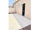 An open back patio with a sliding glass door leading to the home's interior at 4956 S Leisure Way, Gilbert, AZ 85298