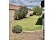 Well-maintained backyard with manicured lawn and desert landscaping perfect for outdoor enjoyment and relaxation at 4956 S Leisure Way, Gilbert, AZ 85298