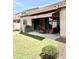 Lush backyard with a covered patio perfect for outdoor entertaining and relaxation at 4956 S Leisure Way, Gilbert, AZ 85298