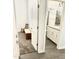 View of a bathroom with a tiled walk-in shower, sink, and cabinet from doorway at 4956 S Leisure Way, Gilbert, AZ 85298