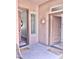 Front entryway of home with decorative wall hanging and doors leading to other rooms at 4956 S Leisure Way, Gilbert, AZ 85298