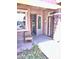 Cozy front porch featuring a seating area, drought-tolerant landscaping, and views into the home at 4956 S Leisure Way, Gilbert, AZ 85298