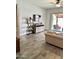 Spacious living room boasts tile floors, neutral walls, and access to the outdoor living area at 4956 S Leisure Way, Gilbert, AZ 85298