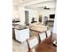 View of the open layout, including the kitchen, dining area, and living room, creating a seamless flow at 4956 S Leisure Way, Gilbert, AZ 85298