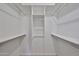 Spacious walk-in closet with shelving and rods for ample storage and organization at 5757 W Eugie Ave # 2068, Glendale, AZ 85304