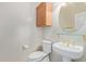 Stylish powder room featuring a pedestal sink and modern fixtures at 5919 W Straight Arrow Ln, Phoenix, AZ 85083