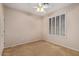 Bedroom with carpet flooring and white shutters at 5919 W Straight Arrow Ln, Phoenix, AZ 85083