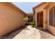 Charming courtyard with stone pathway leading to the front door at 5919 W Straight Arrow Ln, Phoenix, AZ 85083