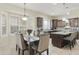 Charming dining area next to the kitchen has bright natural light and a cozy atmosphere at 5957 W Robin Ln, Glendale, AZ 85310