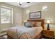 Bedroom with a decorative bed frame, and an ensuite doorway at 6231 E Mark Way # 14, Cave Creek, AZ 85331