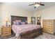 The main bedroom features a king bed, dresser, nightstands, and a doorway to the bathroom at 6231 E Mark Way # 14, Cave Creek, AZ 85331
