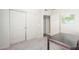 Bedroom featuring neutral carpet and double door closet at 7101 W Beardsley Rd # 542, Glendale, AZ 85308