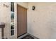 Charming entrance featuring a beige door and clean exterior at 7101 W Beardsley Rd # 542, Glendale, AZ 85308