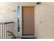 Welcoming entry with a neatly painted door, small window, and decorative cactus at 7101 W Beardsley Rd # 542, Glendale, AZ 85308