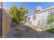 Spacious backyard featuring a mix of gravel, patio, and a block wall fence at 7132 N 63Rd Dr, Glendale, AZ 85301