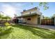 Large grass backyard with a covered patio perfect for outdoor entertaining at 725 W Portland St, Phoenix, AZ 85007