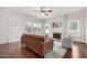 Inviting living room with a fireplace, hardwood floors, and ample natural light at 725 W Portland St, Phoenix, AZ 85007