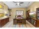 Large office space with custom built-in cabinets, desk, and a bright map as a centerpiece at 7335 E Quail Track Rd, Scottsdale, AZ 85266