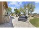 Entertainer's dream with built-in outdoor kitchen, dining area and hot tub with landscaped backyard at 7335 E Quail Track Rd, Scottsdale, AZ 85266