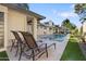 Relaxing backyard featuring a pool and comfortable lounge chairs, perfect for enjoying the outdoors at 7533 N 8Th St, Phoenix, AZ 85020